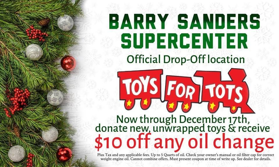 christmas greenery with ornaments and toys for tots 